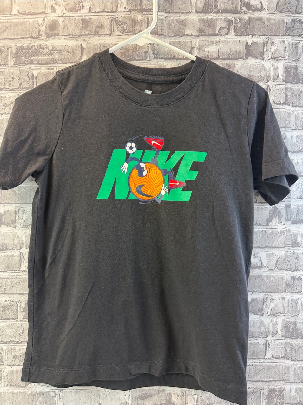 Boy's Nike‎ Black Tee with Green Logo and Orange Soccer Graphic